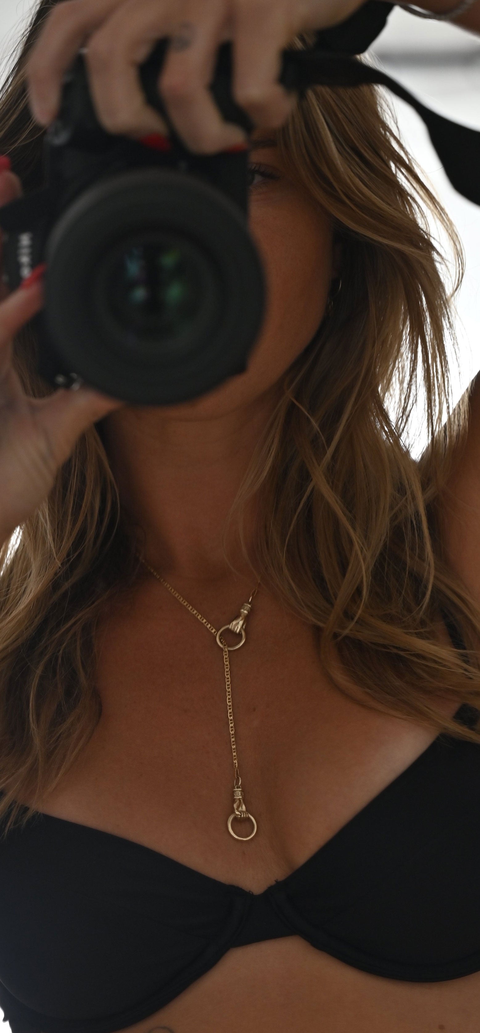 Golden Embrace: Hands of Infinity Necklace