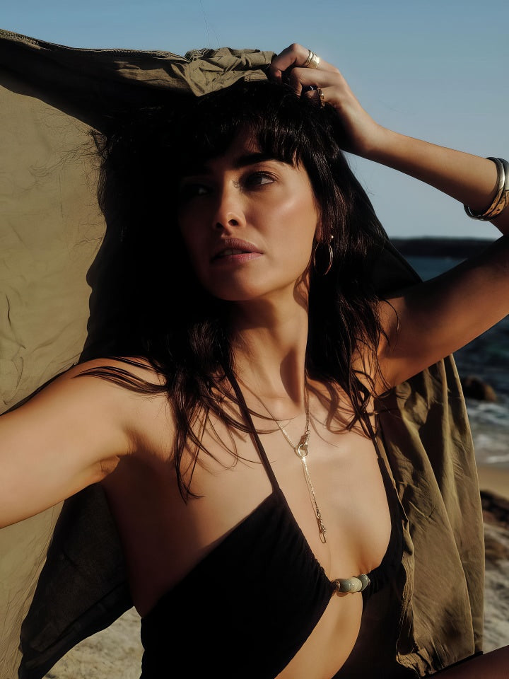 Golden Embrace: Hands of Infinity Necklace