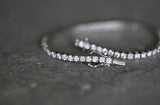 5ct lab diamond tennis bracelet in 9ct white gold with a shimmering finish